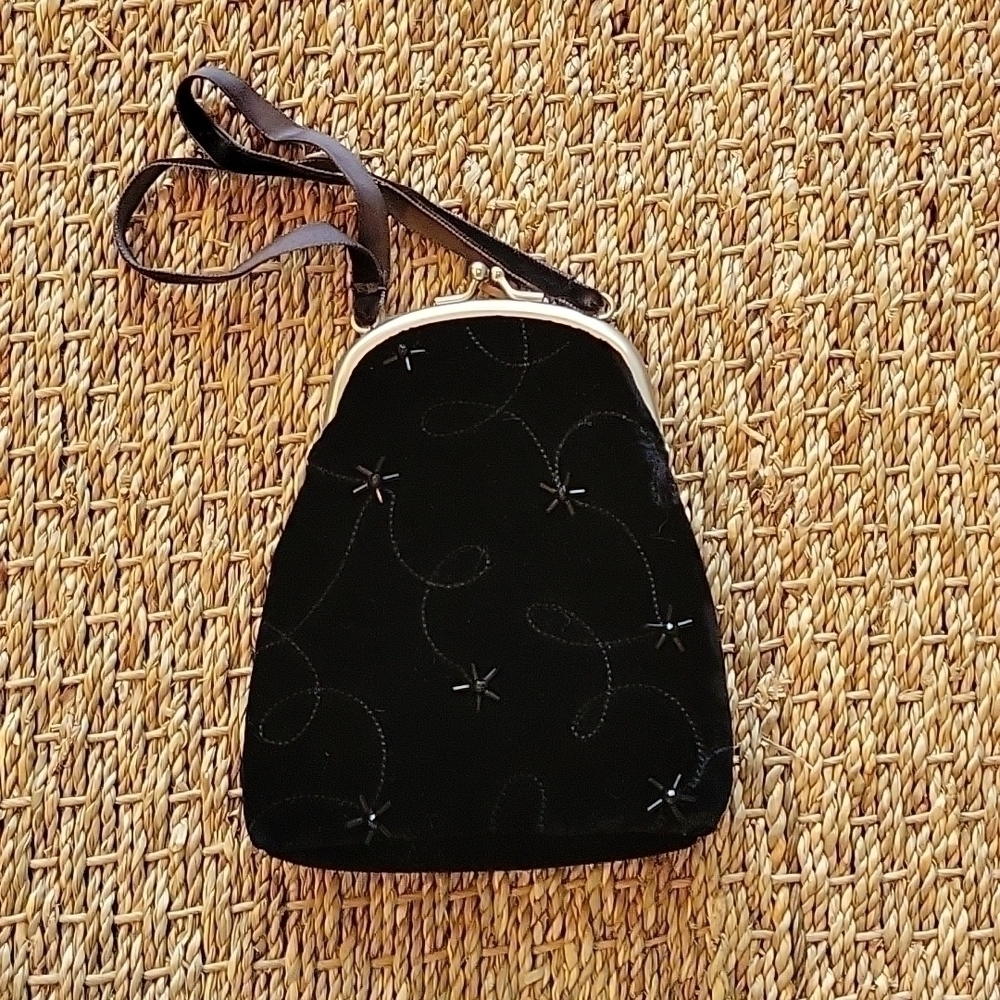 LITTLE black velvet purse with velvet straps and beads. Tag says gymboree.